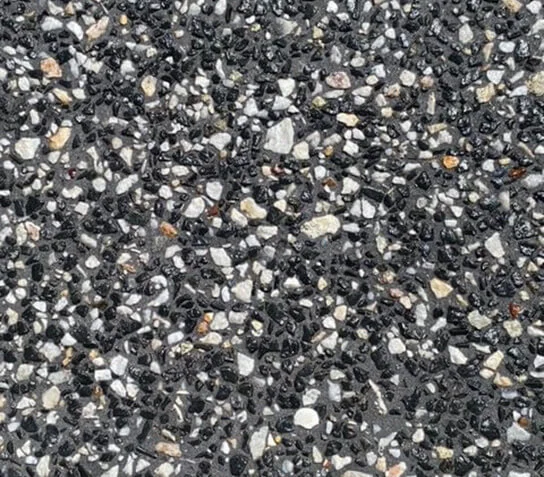 Exposed aggregate driveway with an Indian ink oxide base